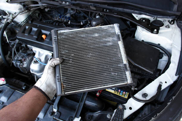 Image showing the location of a heater core in a vehicle dashboard.